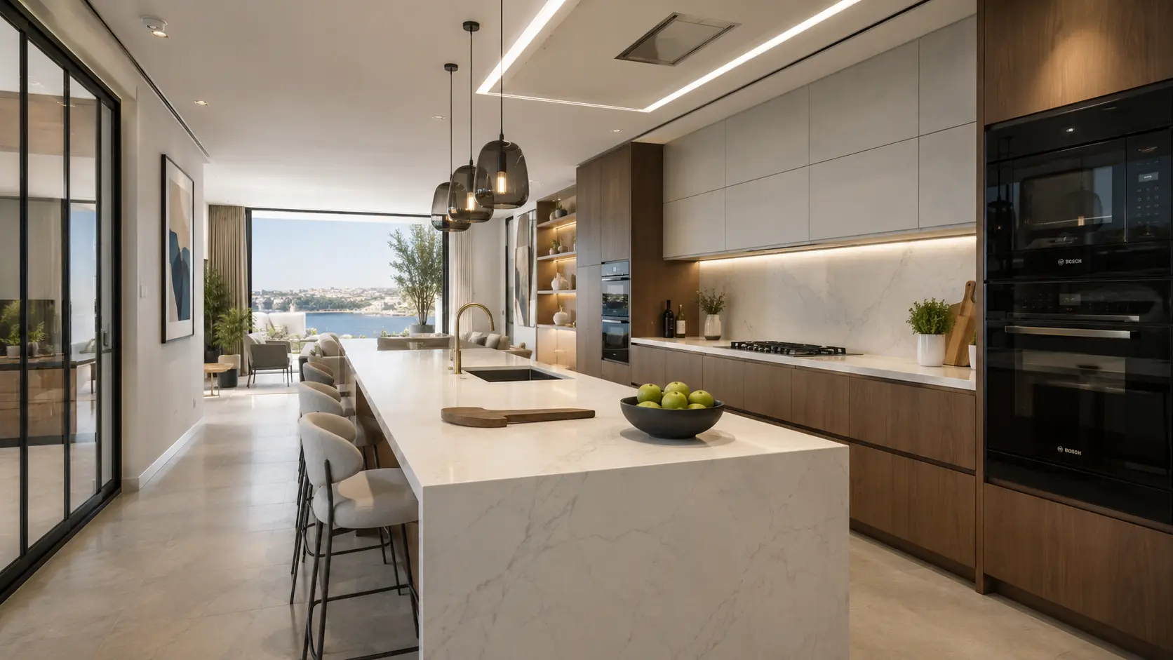 Luxury modern kitchen design with white marble island, walnut wood cabinetry, integrated appliances, and contemporary pendant lighting in Malta by Aces Design Studio